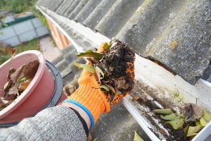 cleaning gutters is part of basic home maintenance